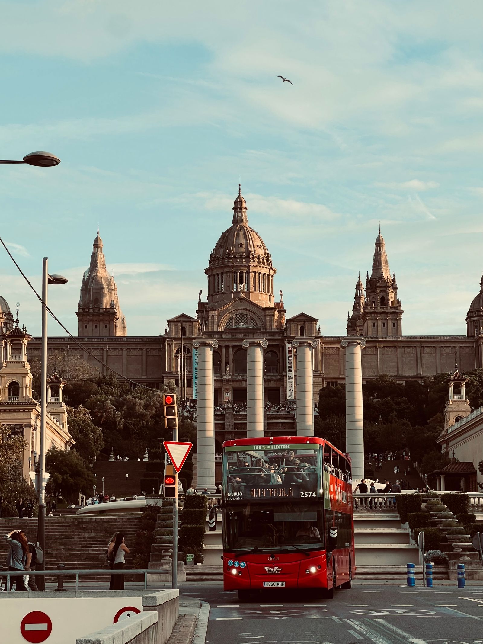 Red Barcelona city bus at Plaça d'Espanya